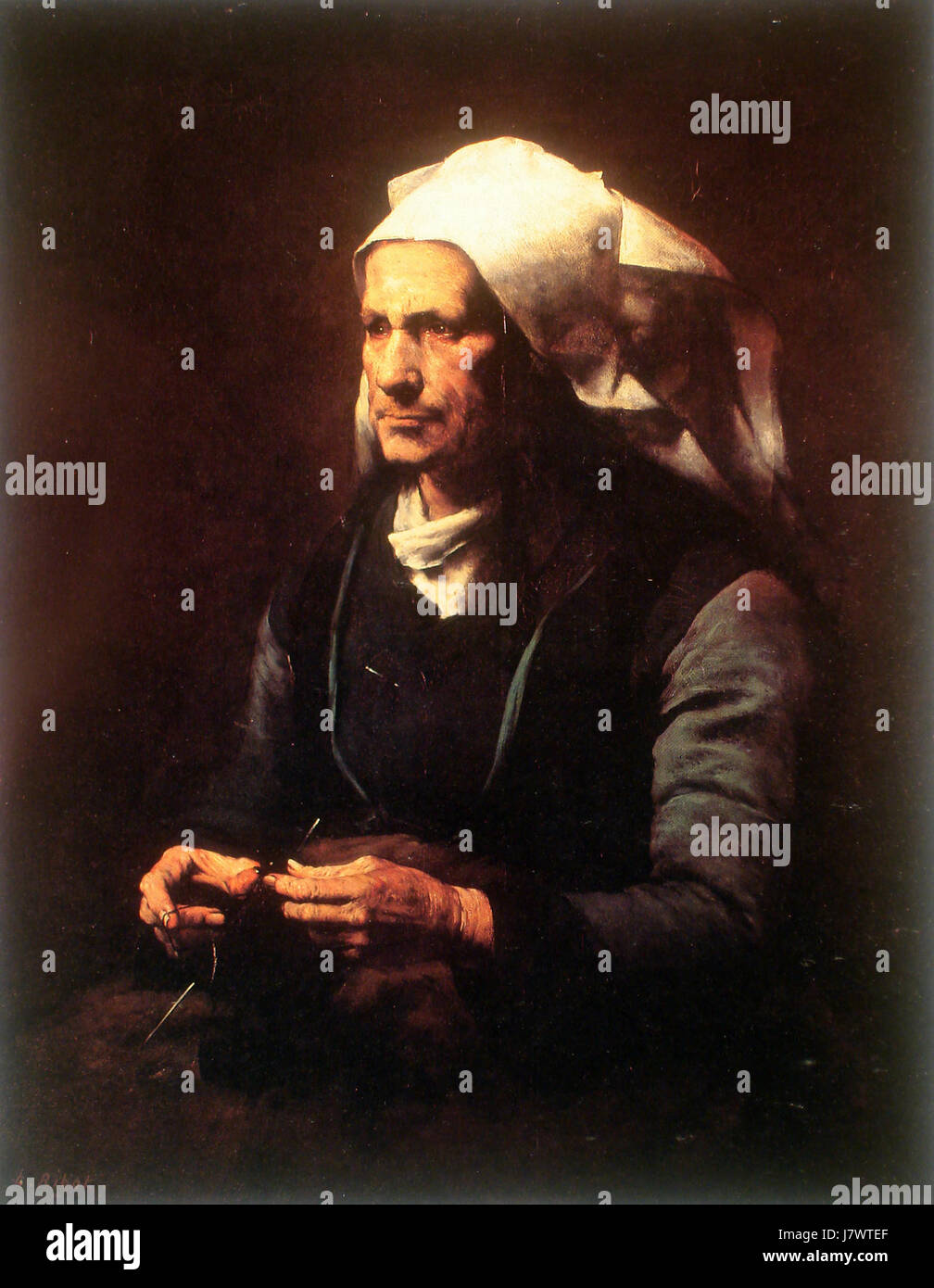 Anciana bretona si riferisce a una donna bretone anziana, che probabilmente raffigura l'abbigliamento e lo stile di vita tradizionali del popolo bretone. L'immagine o il riferimento potrebbe catturare un aspetto culturale della vita in Bretagna, Francia, in particolare legato alle donne anziane nelle comunità rurali. Foto Stock