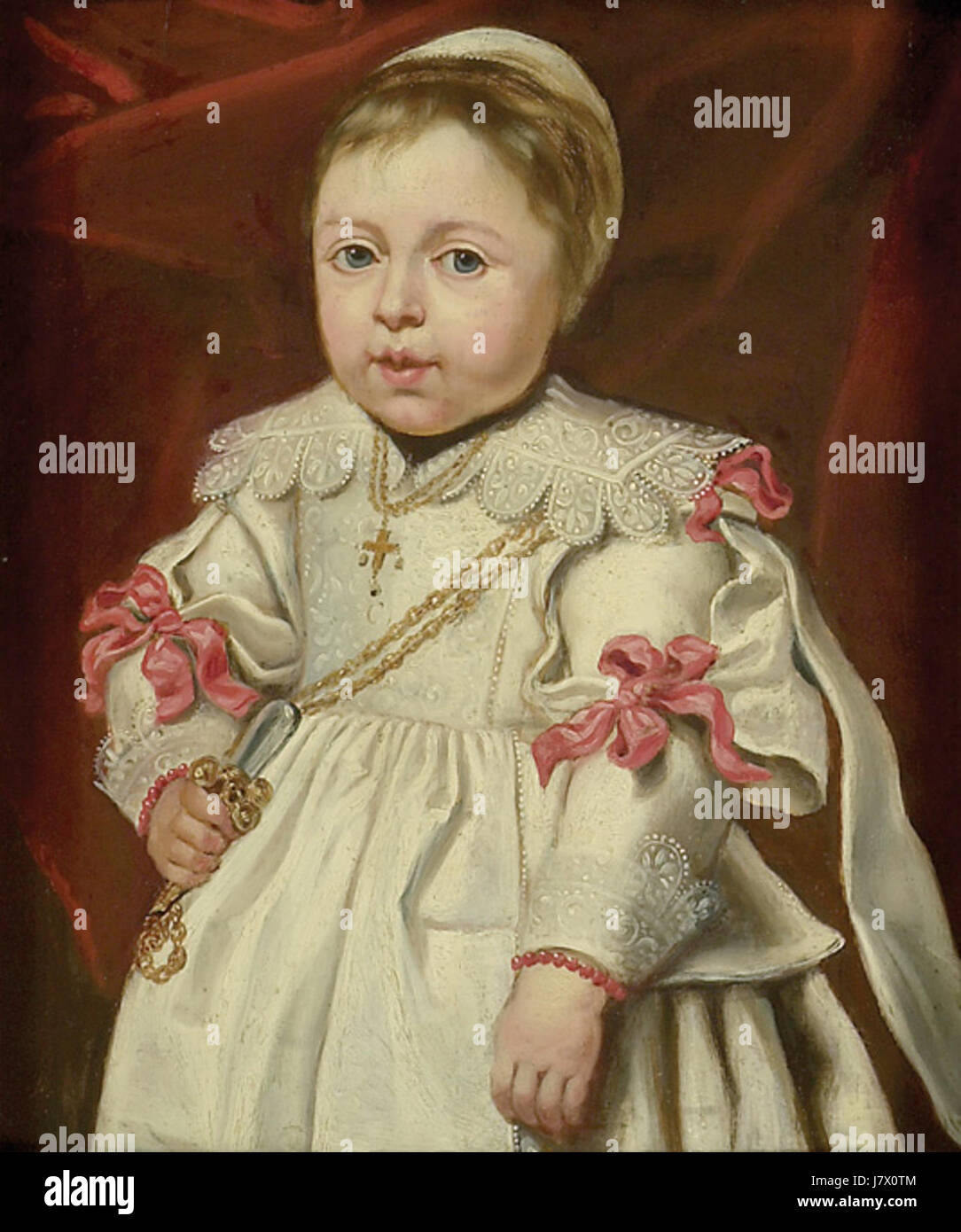 Cornelis de Vos, un pittore fiammingo del XVII secolo, ha creato questo ritratto di un bambino che regge un sonaglino, mostrando la sua abilità nel catturare l'innocenza e i bei dettagli della vita quotidiana nelle sue opere. Foto Stock