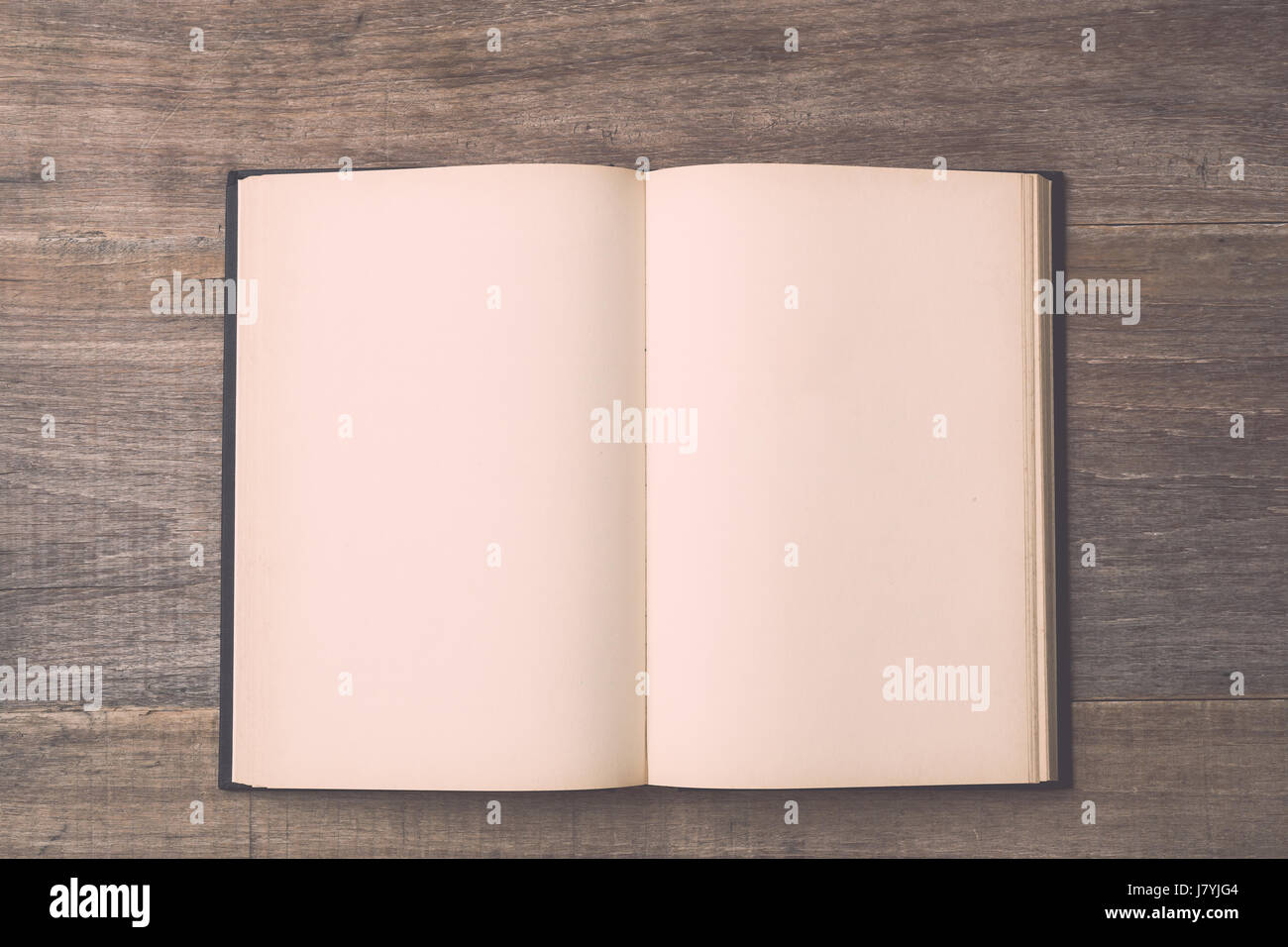 Vista superiore vecchio libro su tavola in legno sfondo Foto Stock