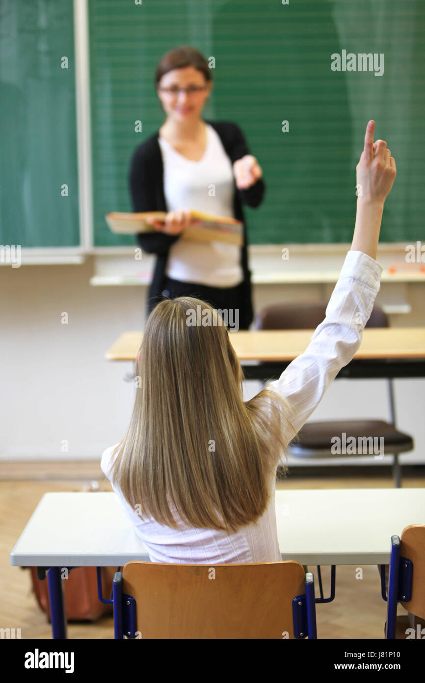 Insegnante di educazione scheda lettere verdi allievo impara schoolgirl informazioni di dati Foto Stock