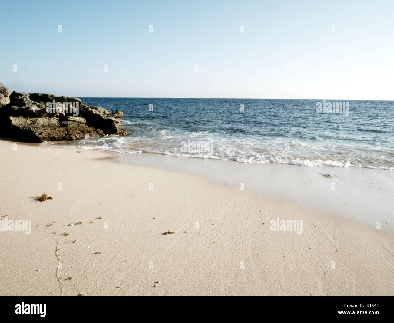 Una bella immagine di spiaggia di sabbia bianca Foto Stock