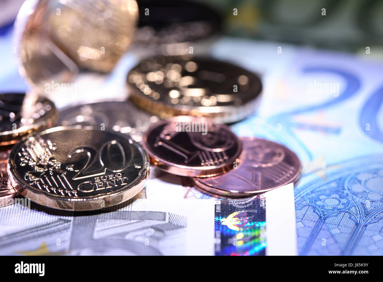 Extreme closeup della Banca europea banconote e monete Foto Stock