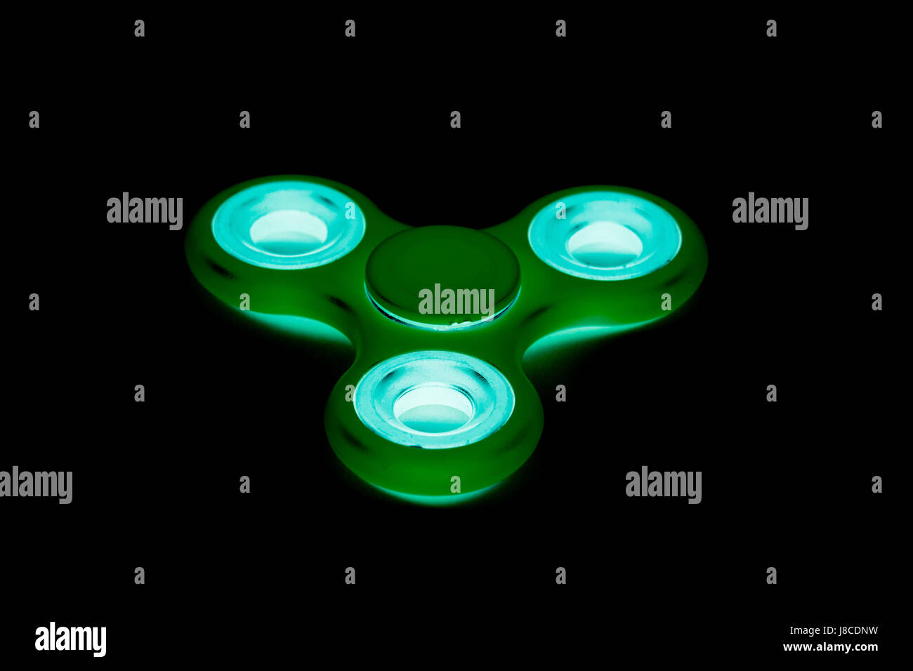 Agitano: Spinner negli isolati di sfondo per il rilascio degli stress durante il lavoro Foto Stock