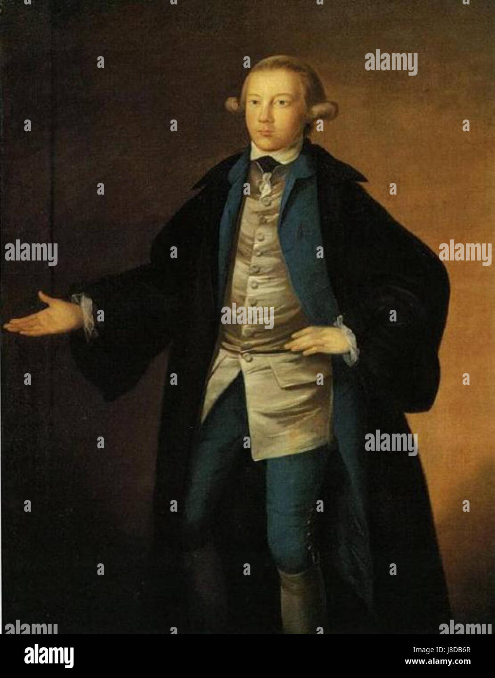 Questa immagine raffigura James McCulloch vestito con abiti da laurea, un tipico abbigliamento accademico indossato dagli studenti dell'istruzione superiore. La fotografia mette in evidenza le tradizionali insegne accademiche utilizzate nelle università. Foto Stock