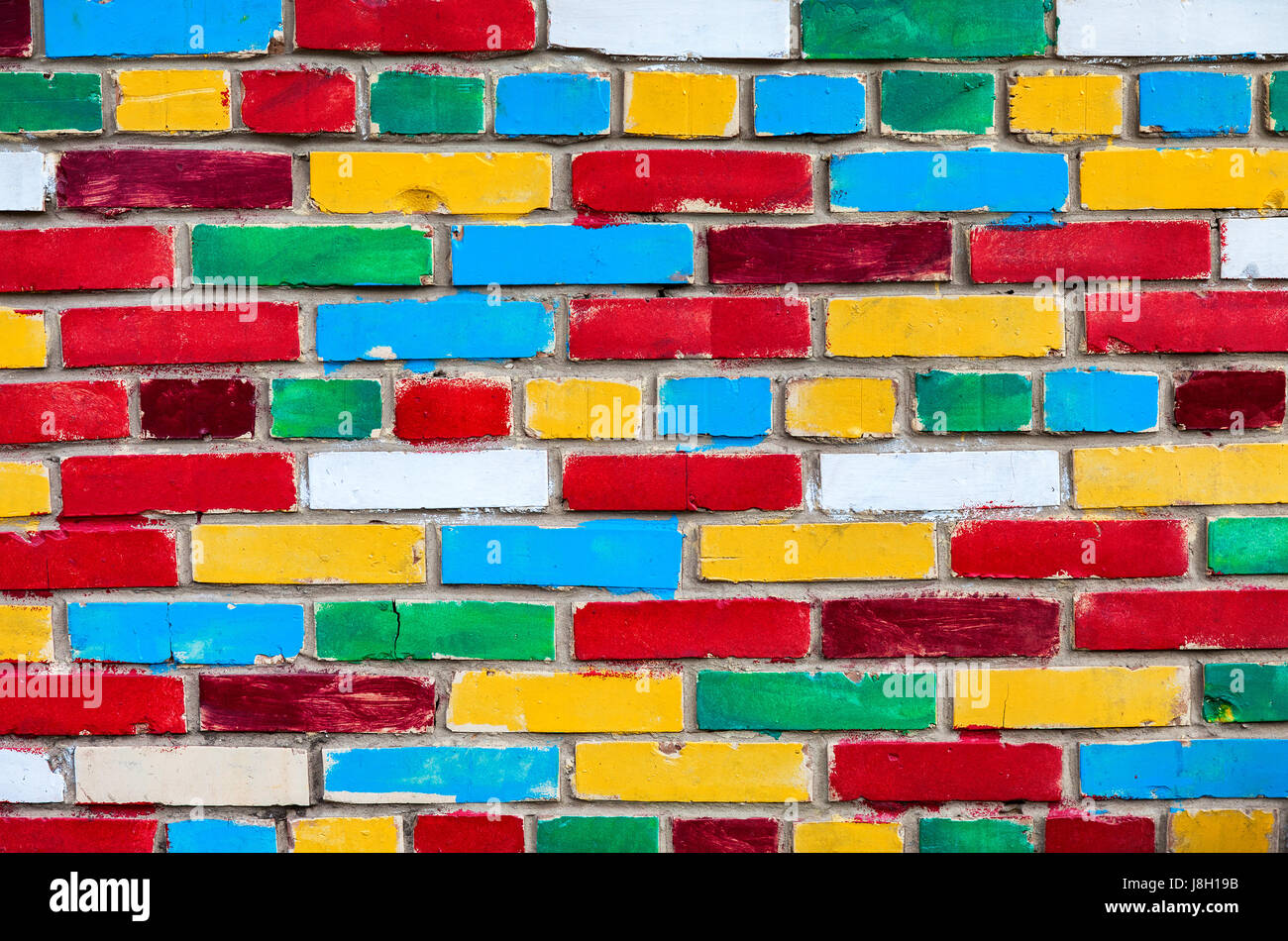 In mattoni colorati da parete multi i mattoni colorati come un creativo texture di sfondo Foto Stock