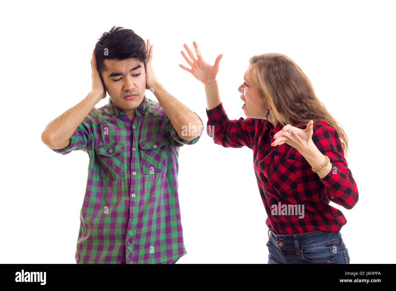 Coppia giovane in plaid shirt sostenendo Foto Stock