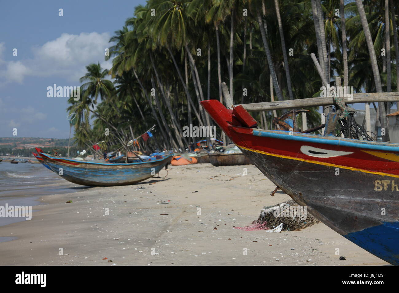 Asia, spiaggia, mare, spiaggia, mare, palme, barca da pesca, Viet Nam, Foto Stock