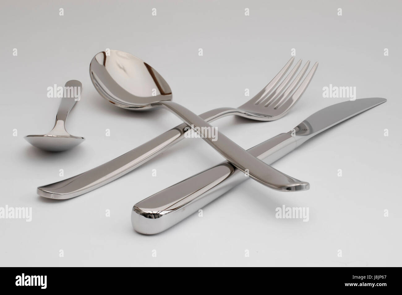 Attrezzo, argento, metallo, luminoso e brillante, forcella, implementare, tagliare, crooked, deformata Foto Stock