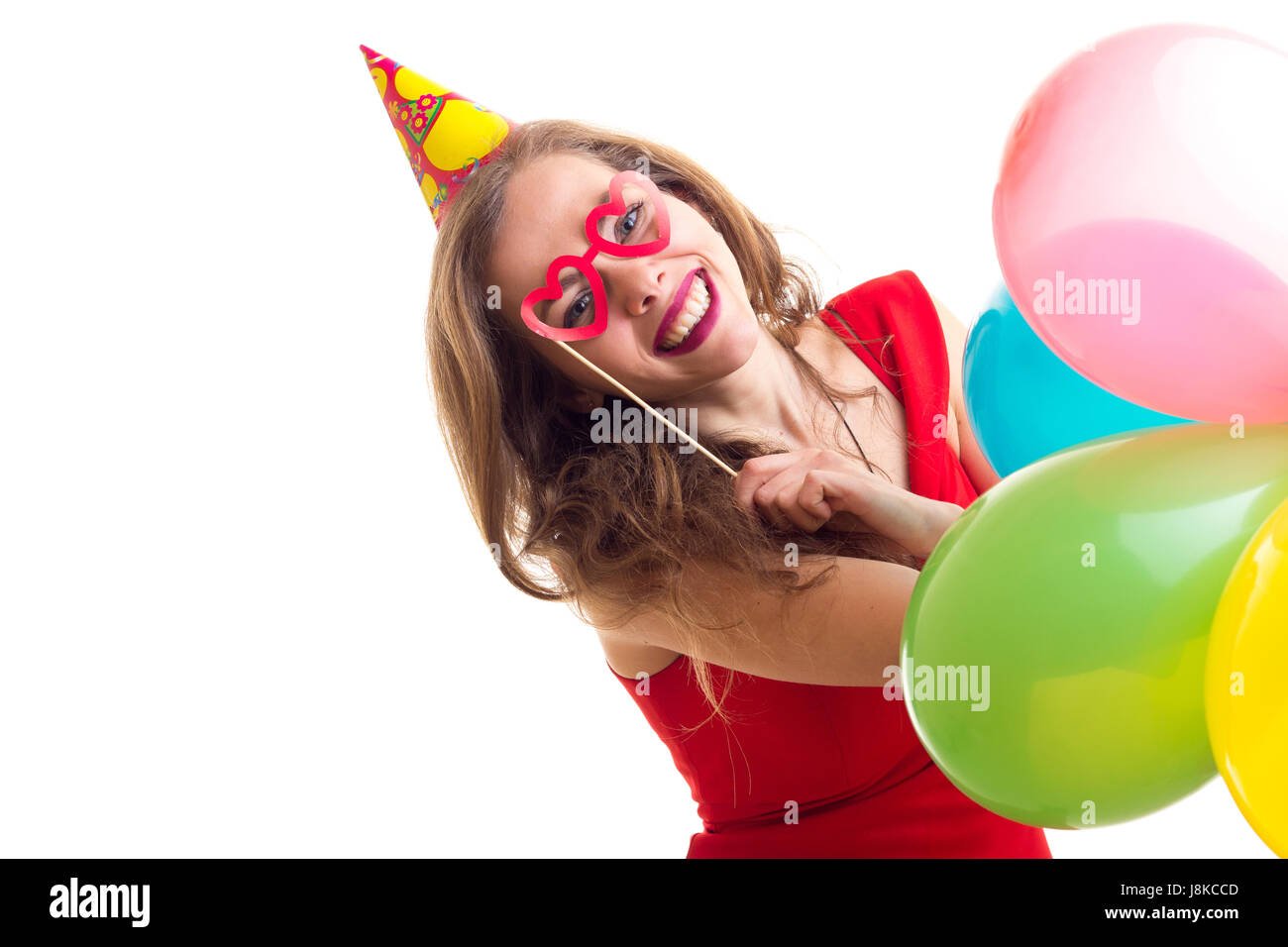 Giovane donna palloncini di contenimento Foto Stock