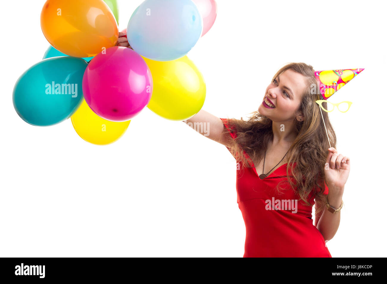 Giovane donna palloncini di contenimento Foto Stock