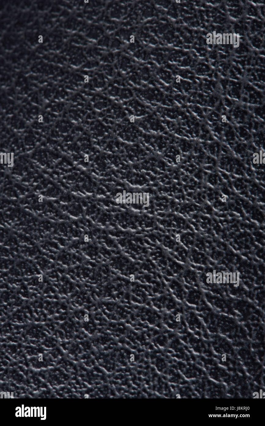 Nero in pelle animale superficie di sfondo. Cellule in nero in pelle testurizzata Foto Stock