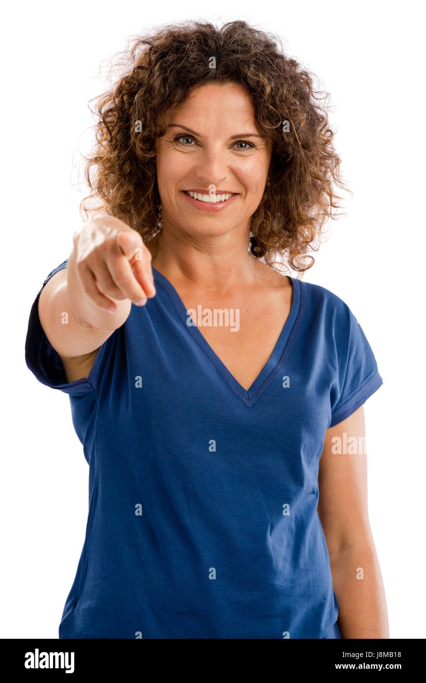 Ritratto di un sorridente donna di mezza età rivolta verso la telecamera Foto Stock