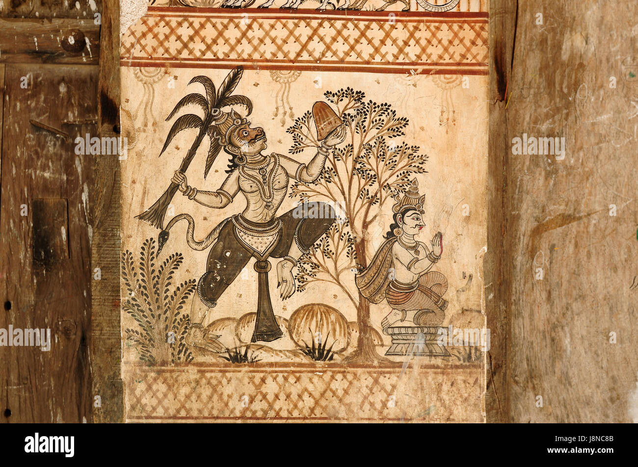 Disegnato a mano la tradizionale antica arte tribale India di un villaggio a parete in Orissa, India Foto Stock