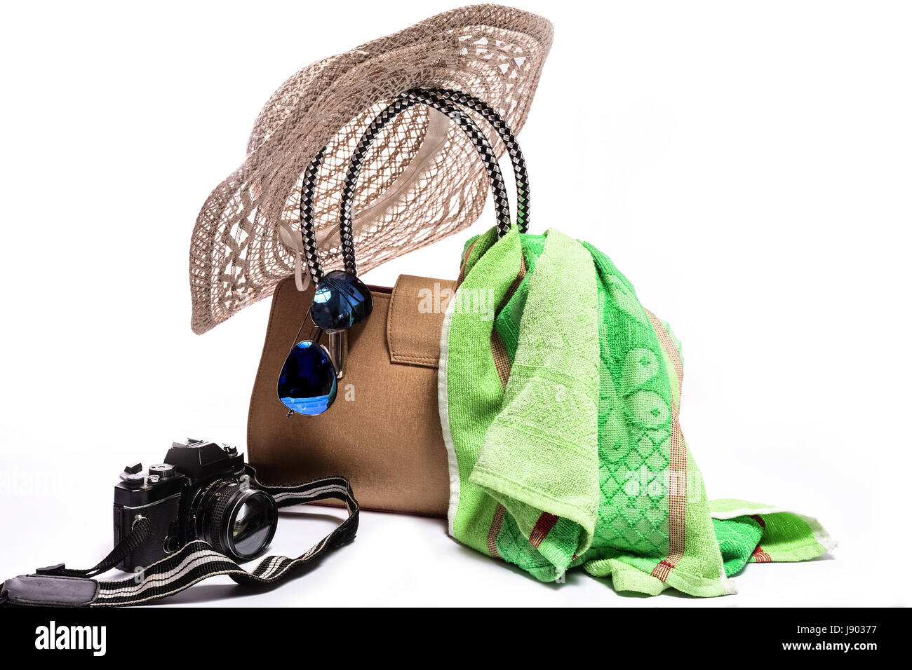 Accessori da viaggio su sfondo bianco Foto Stock