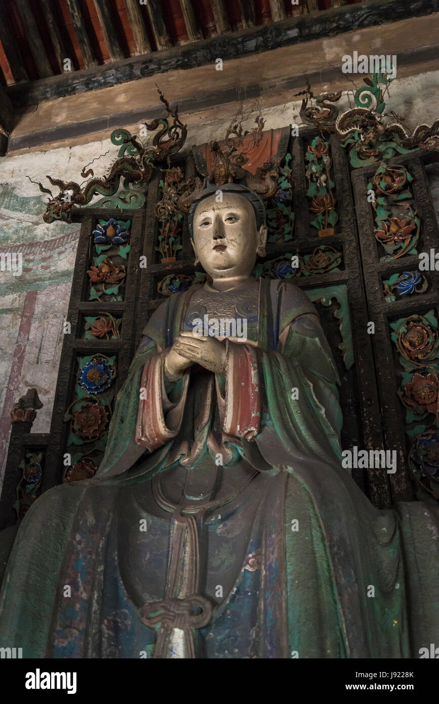 La madre e il bambino scultura, sala della dea della fertilità, Tempio di Shuanglin, un grande tempio buddista della dinastia Ming, Pingyao, nella provincia di Shanxi, Foto Stock