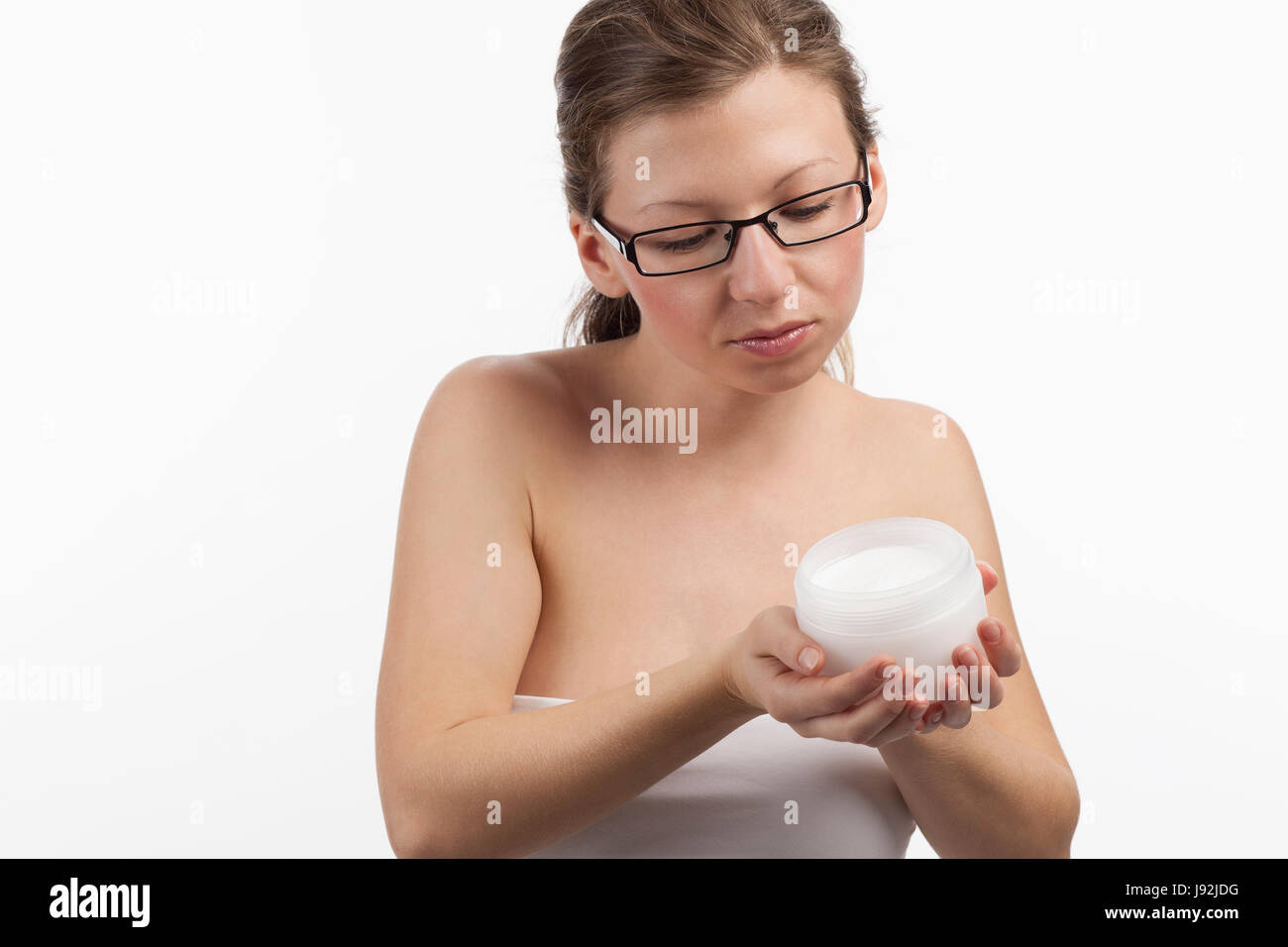 Donna, cosmetici, cure di bellezza, panna, crema per il corpo, trattamenti viso, bellezza, bello, Foto Stock