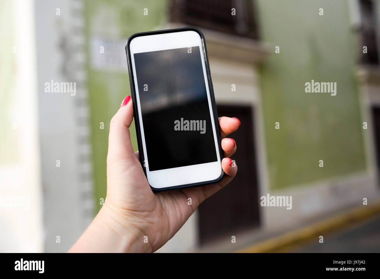 Donna telefono azienda Foto Stock