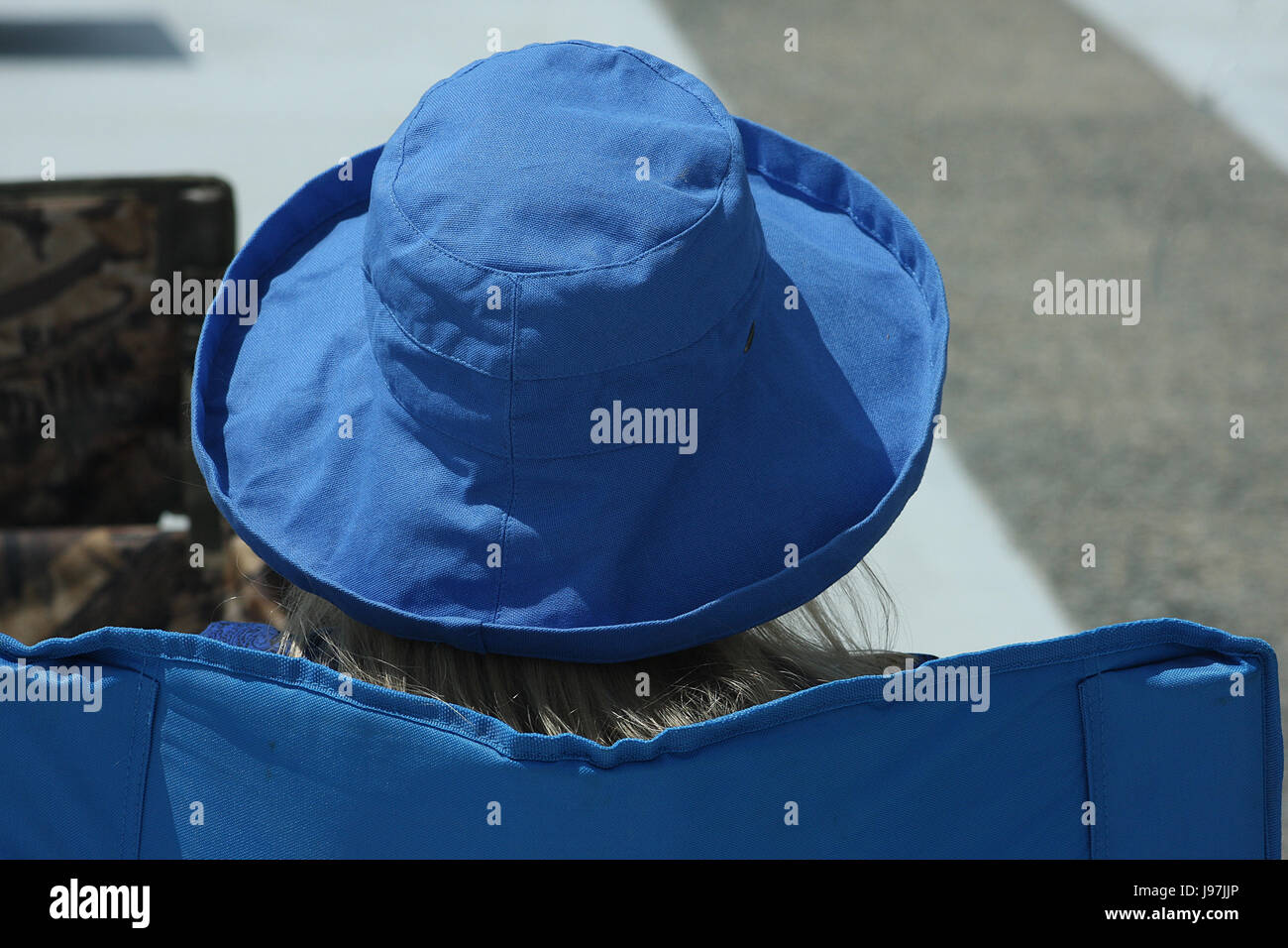 Close up hat copre persona della testina durante l'evento esterno Foto Stock
