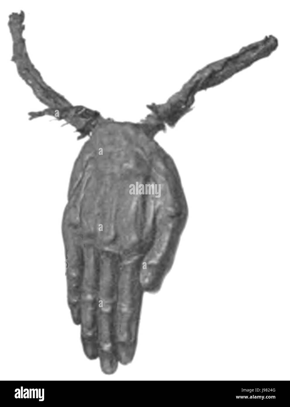 Questa immagine raffigura una figura di Bret o mano morta, un significativo artefatto culturale delle tribù native del sud-est dell'Australia. La mano simboleggia la connessione ancestrale e il significato spirituale nelle tradizioni aborigene. Foto Stock