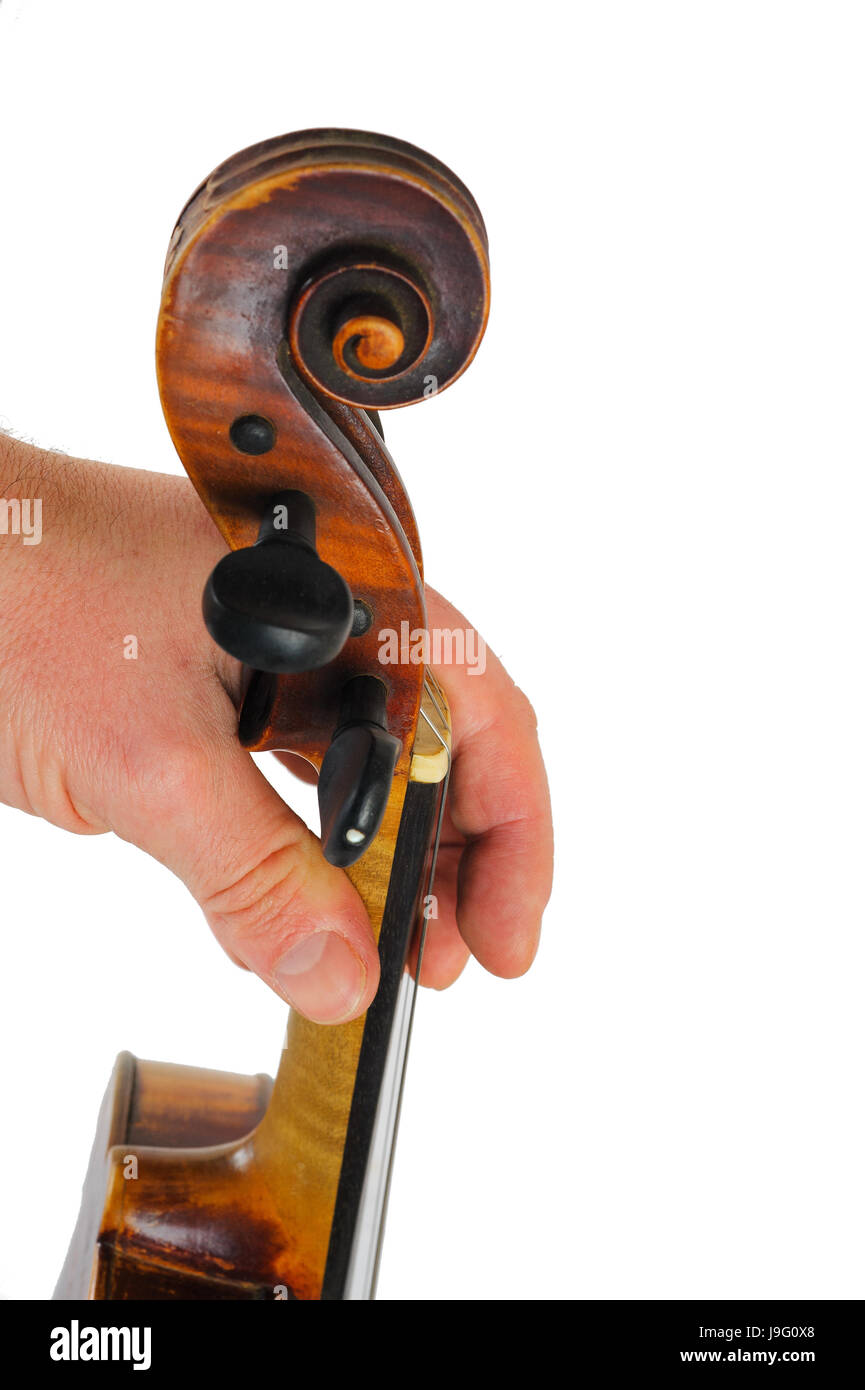 Immagine violino risiede in una mano umana.stringa strumento isolato su sfondo bianco.dita riprodurre musica Foto Stock