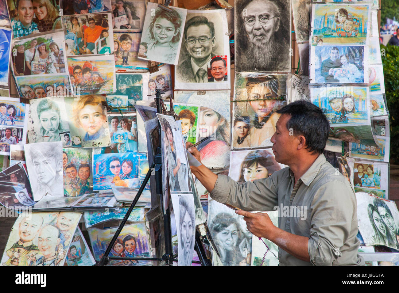 Cina, Hong Kong Kowloon, Tsim Sha Tsui, Viale delle Stelle, ritrattista Foto Stock