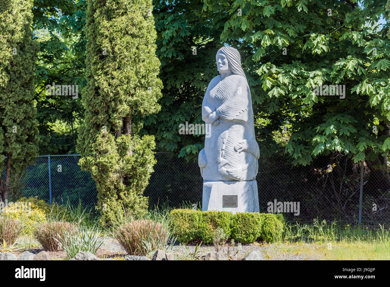 La scultura in marmo da Daniel J Cline, Chemainus, Isola di Vancouver, British Columbia, Canada Foto Stock