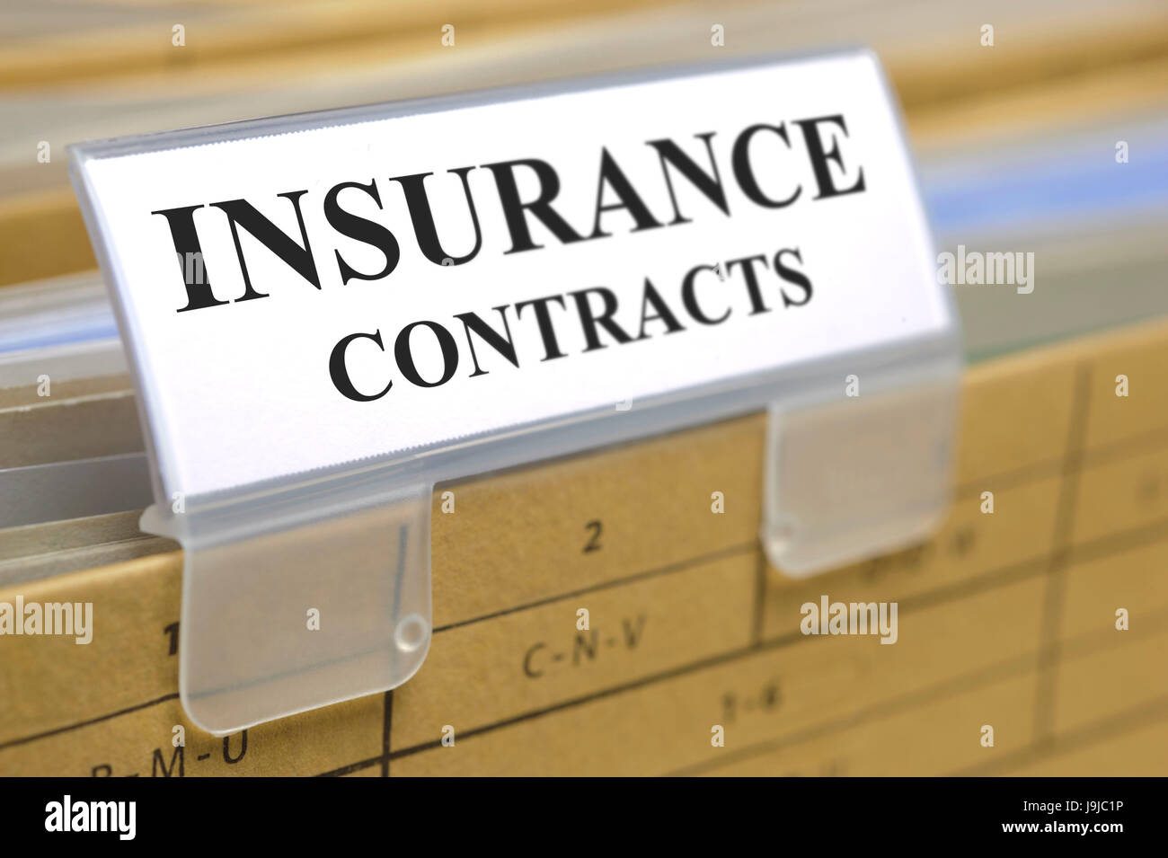 I contratti di assicurazione nella cartella di file Foto Stock