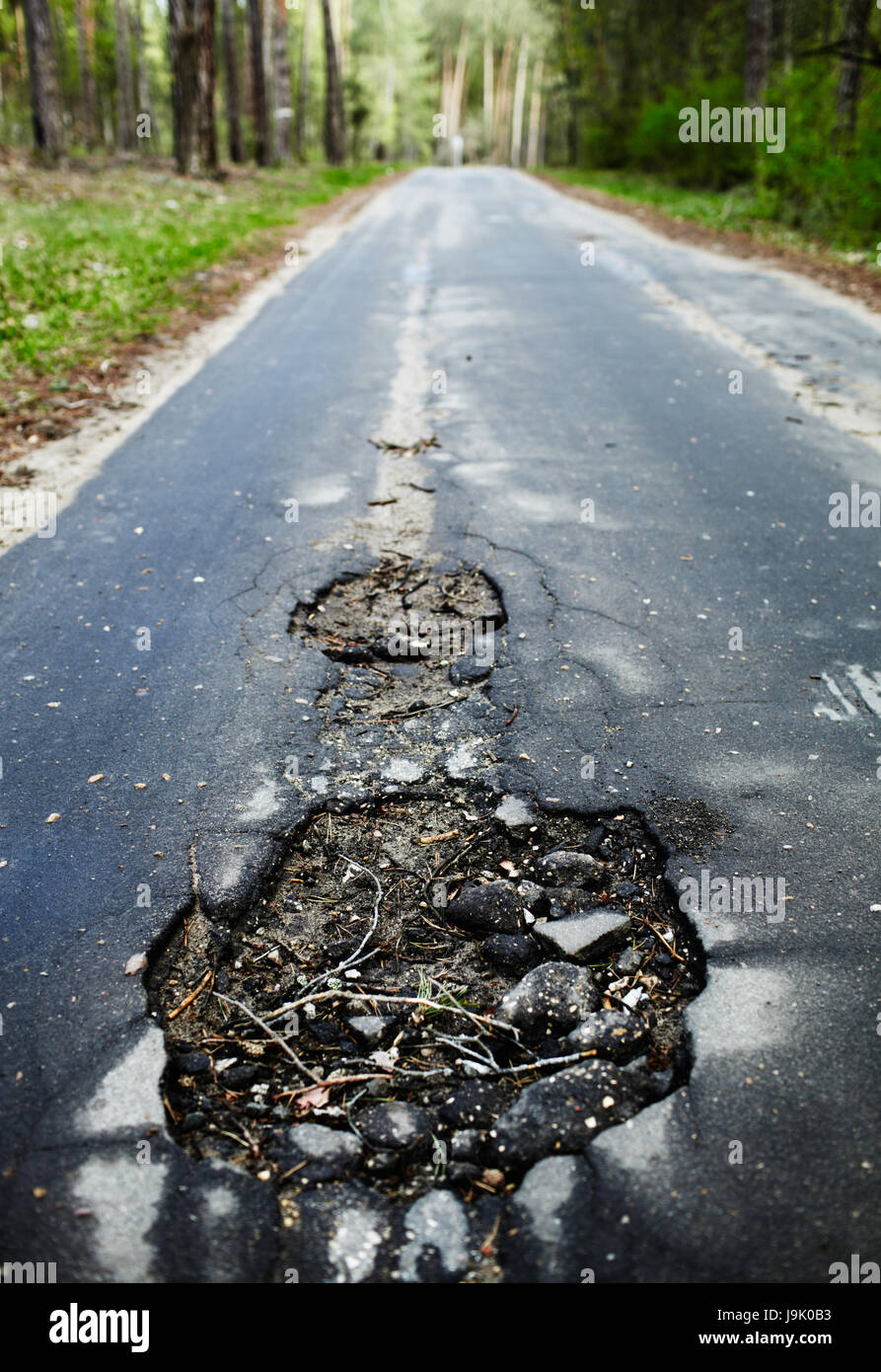 Pericolo di infortunio, asfalto, rotto, via autostrada, highway, il foro, difetto, Foto Stock