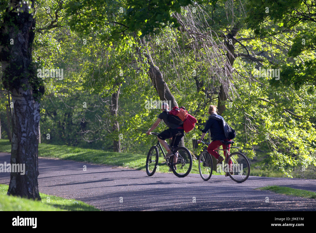 Glasgow Kelvingrove Park scene i ciclisti in bici Foto Stock