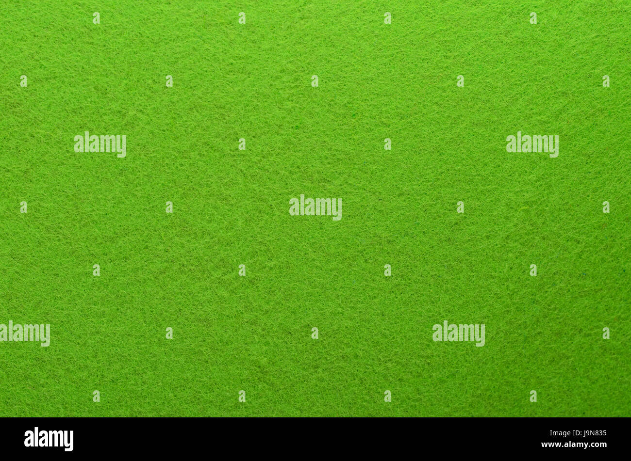 Feltro verde sullo sfondo di texture. Tessitura di fibre del feltro di close-up Foto Stock