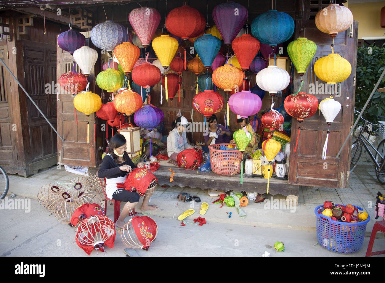 Il Vietnam,Hoi In,donne,la produzione della lampada, Foto Stock