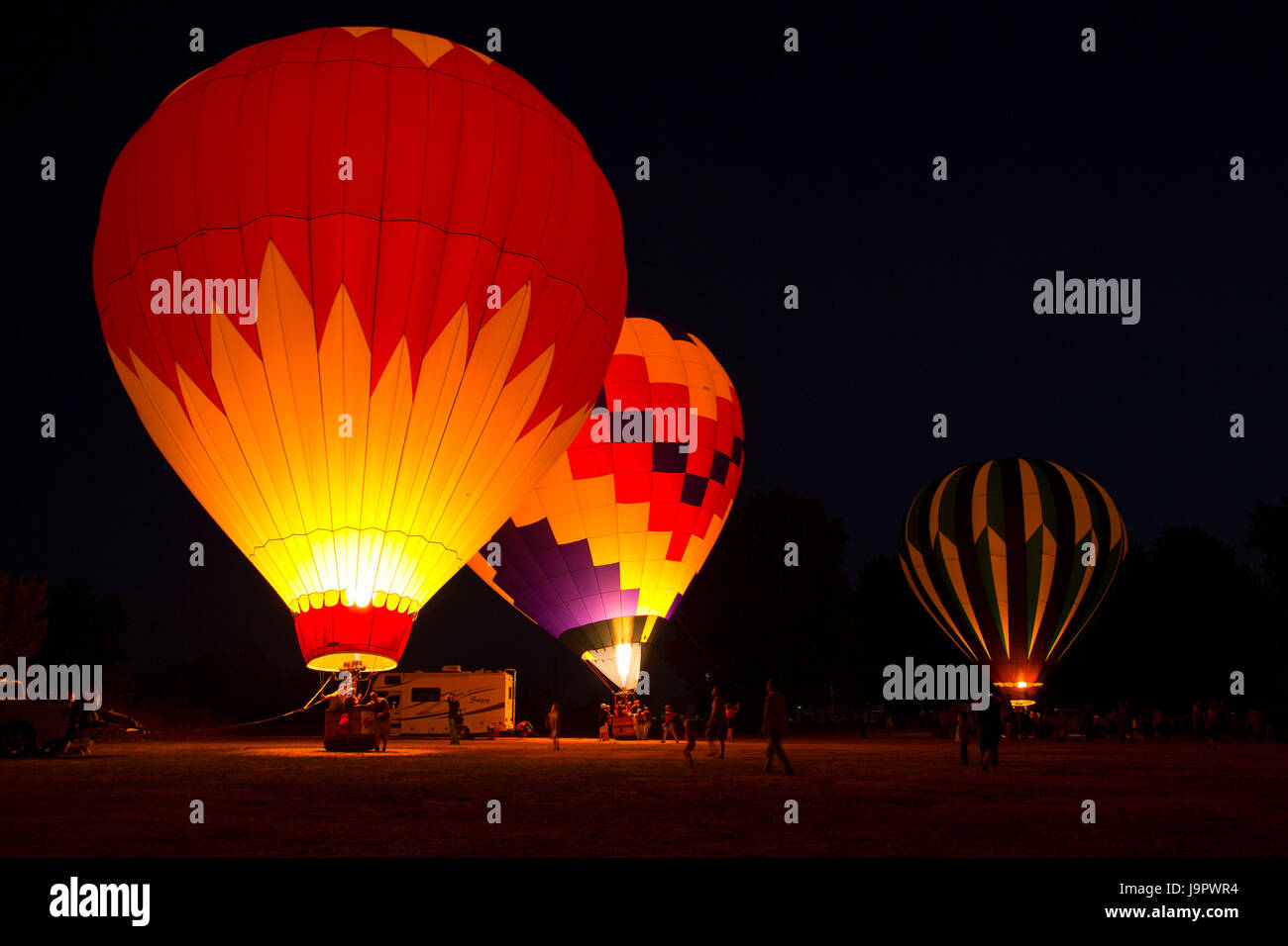 In mongolfiera ad aria calda notte glow, Northwest Arte e Air Festival, legname Linn Park, Albany, Oregon Foto Stock