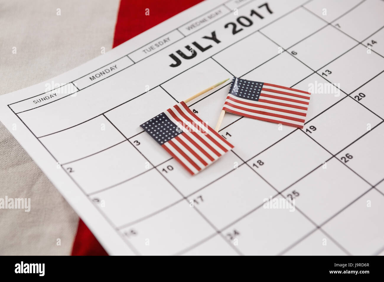 Calendario contrassegnati con bandiere nordamericane come promemoria con 4 luglio tema Foto Stock
