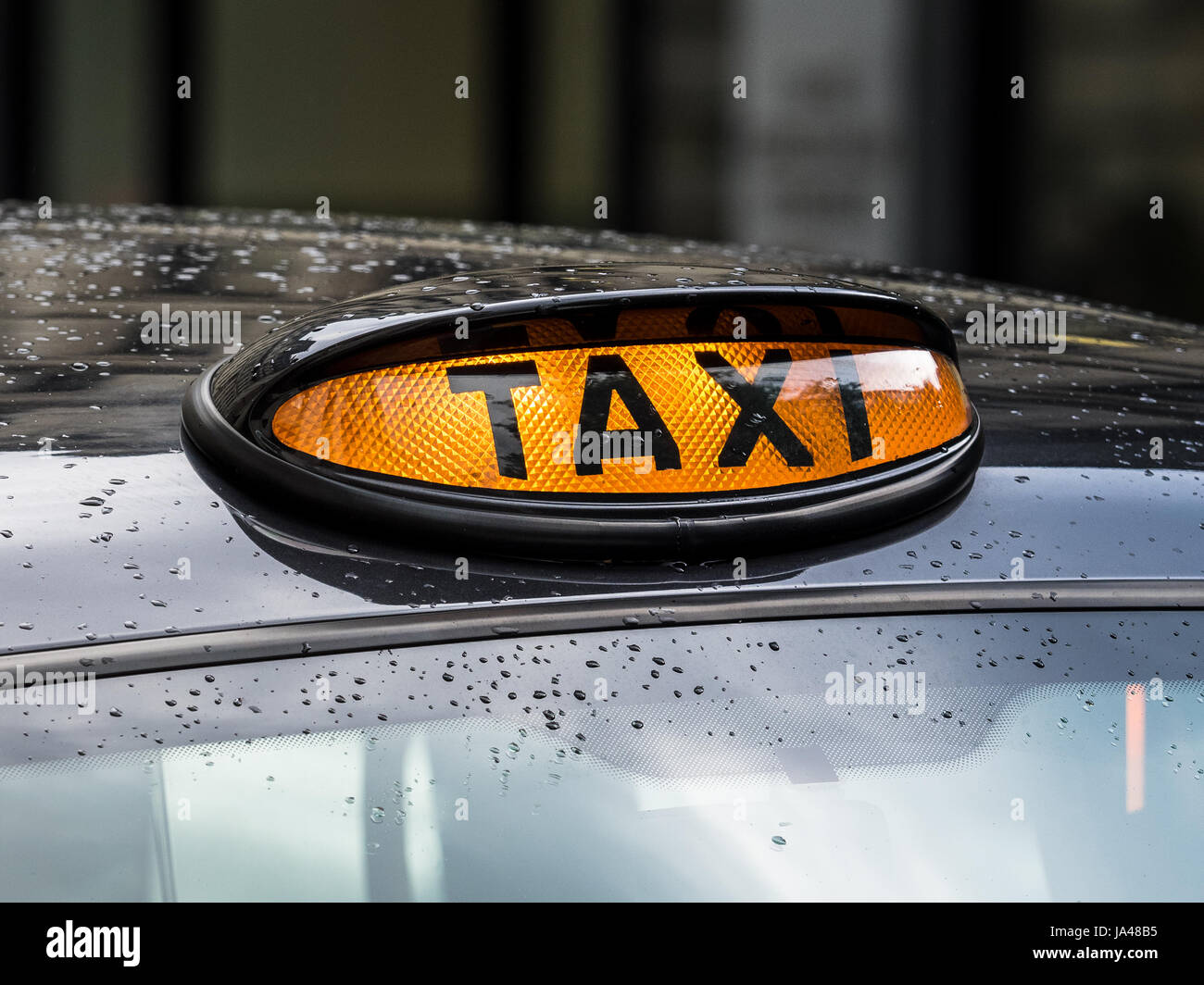 London Taxi I taxi neri di Londra - Taxi segni del tetto su un taxi a Londra (Black Cab) Foto Stock