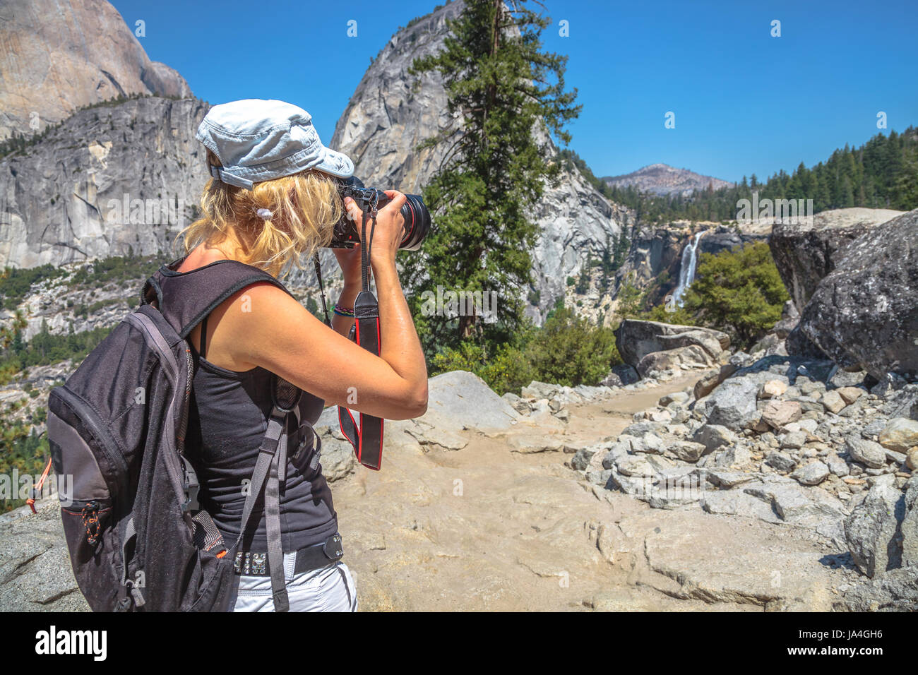 Fotografo in cascate Yosemite Foto Stock