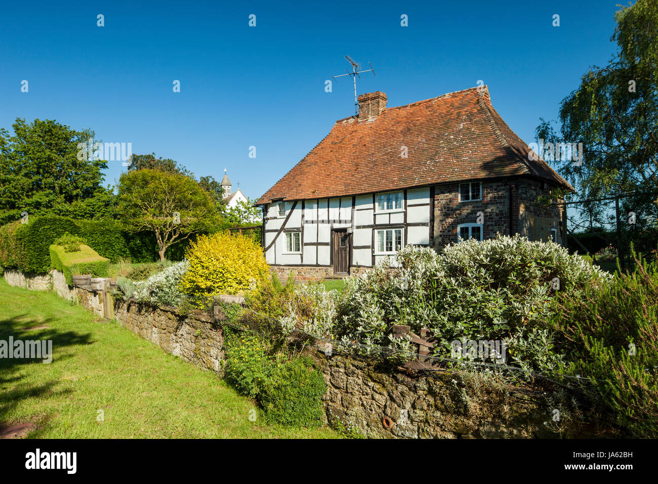 A struttura mista in legno e muratura in cottage Hardham Village West Sussex, in Inghilterra. Foto Stock