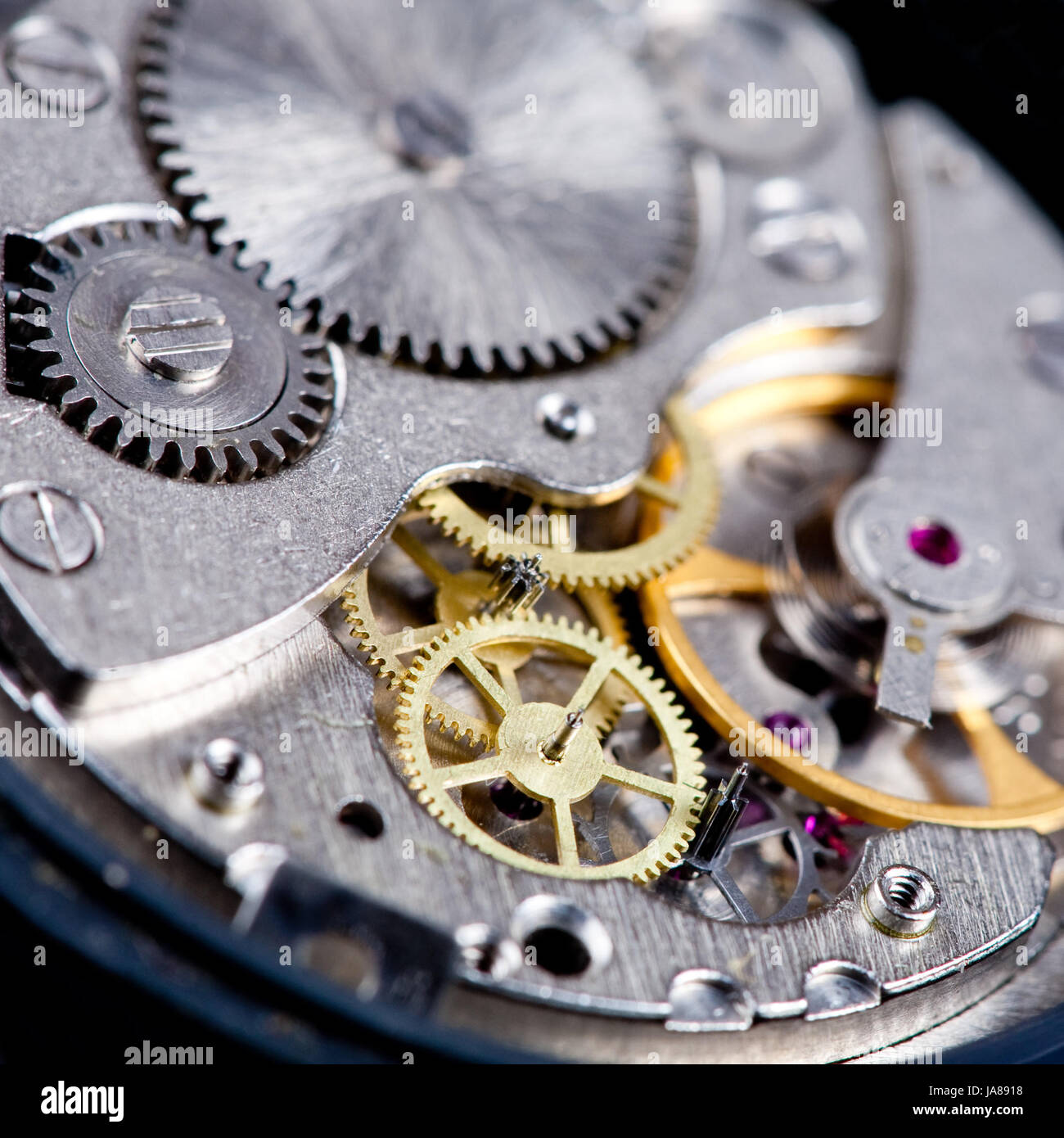 Ingranaggi smontato in un orologio da polso close up Foto stock - Alamy