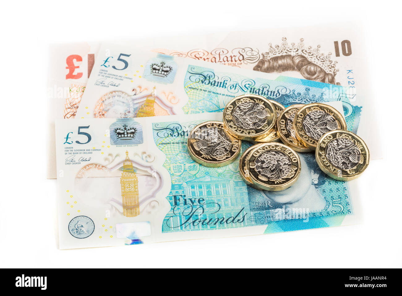 British una libbra di monete su British banconote Foto Stock