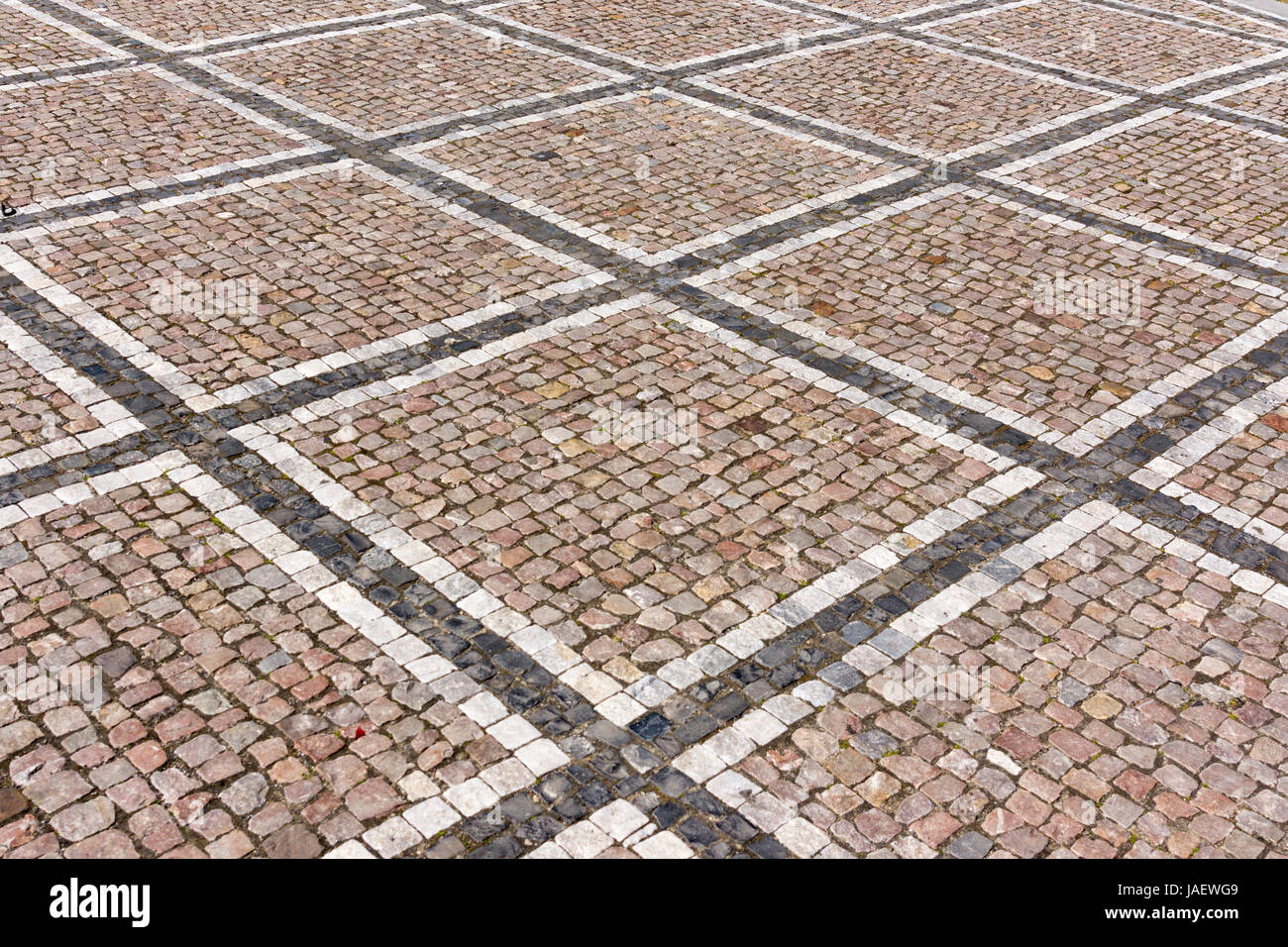 Bella modellato cobblestone pavement fuori del Ministero degli Affari Esteri, Praga, Repubblica Ceca Foto Stock