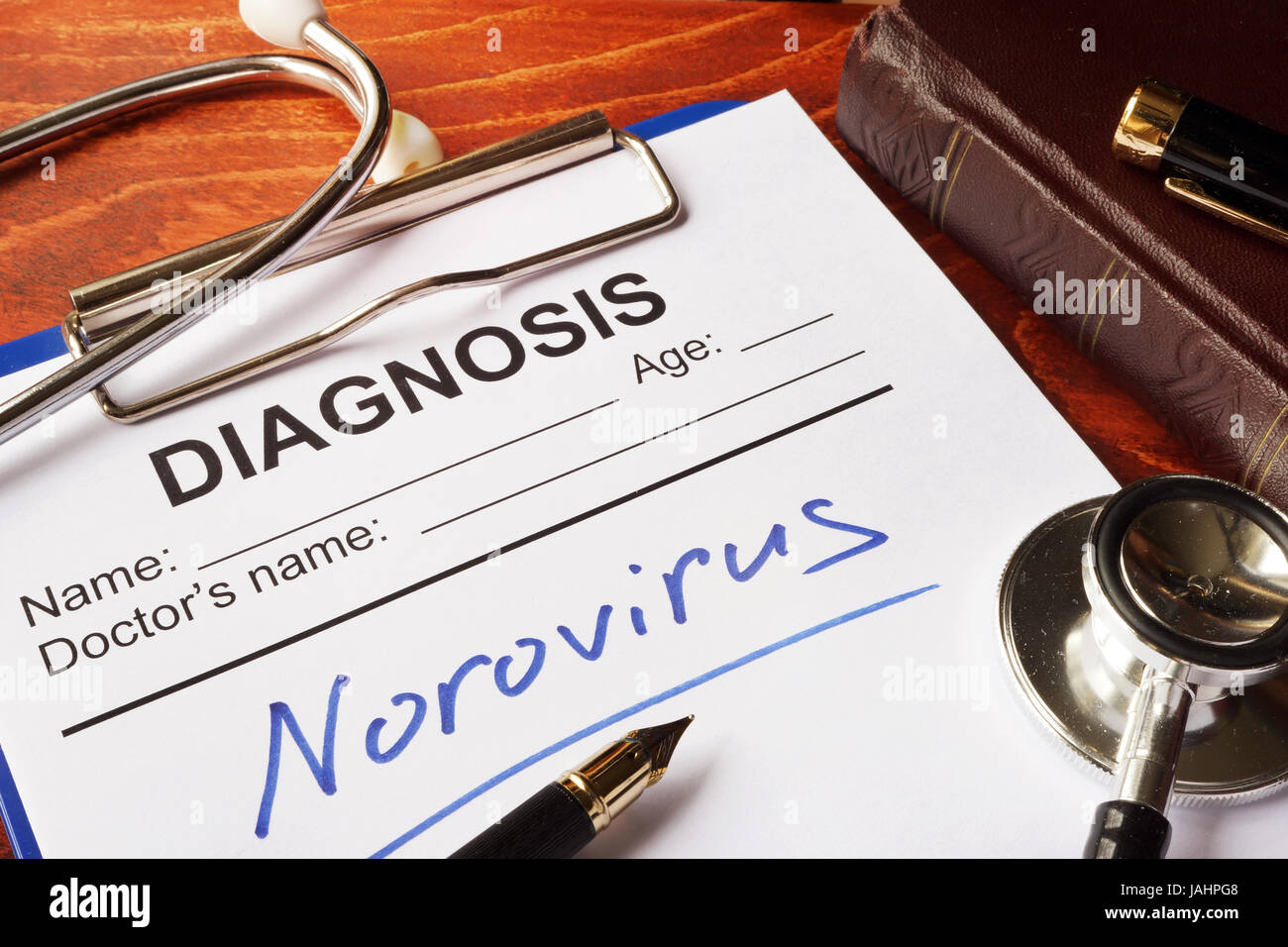 La forma medica con diagnosi Norovirus su un tavolo. Foto Stock