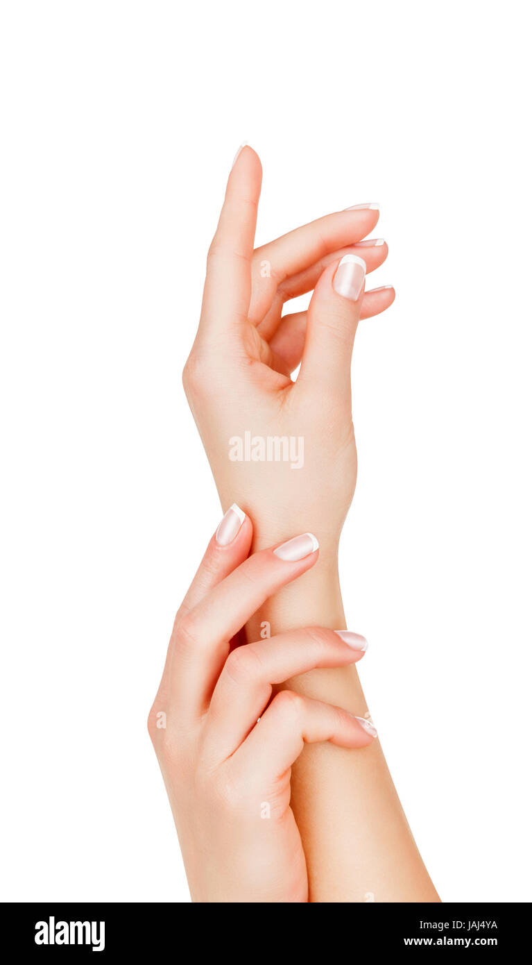 Bella mani femminili con french manicure isolati su sfondo bianco Foto Stock