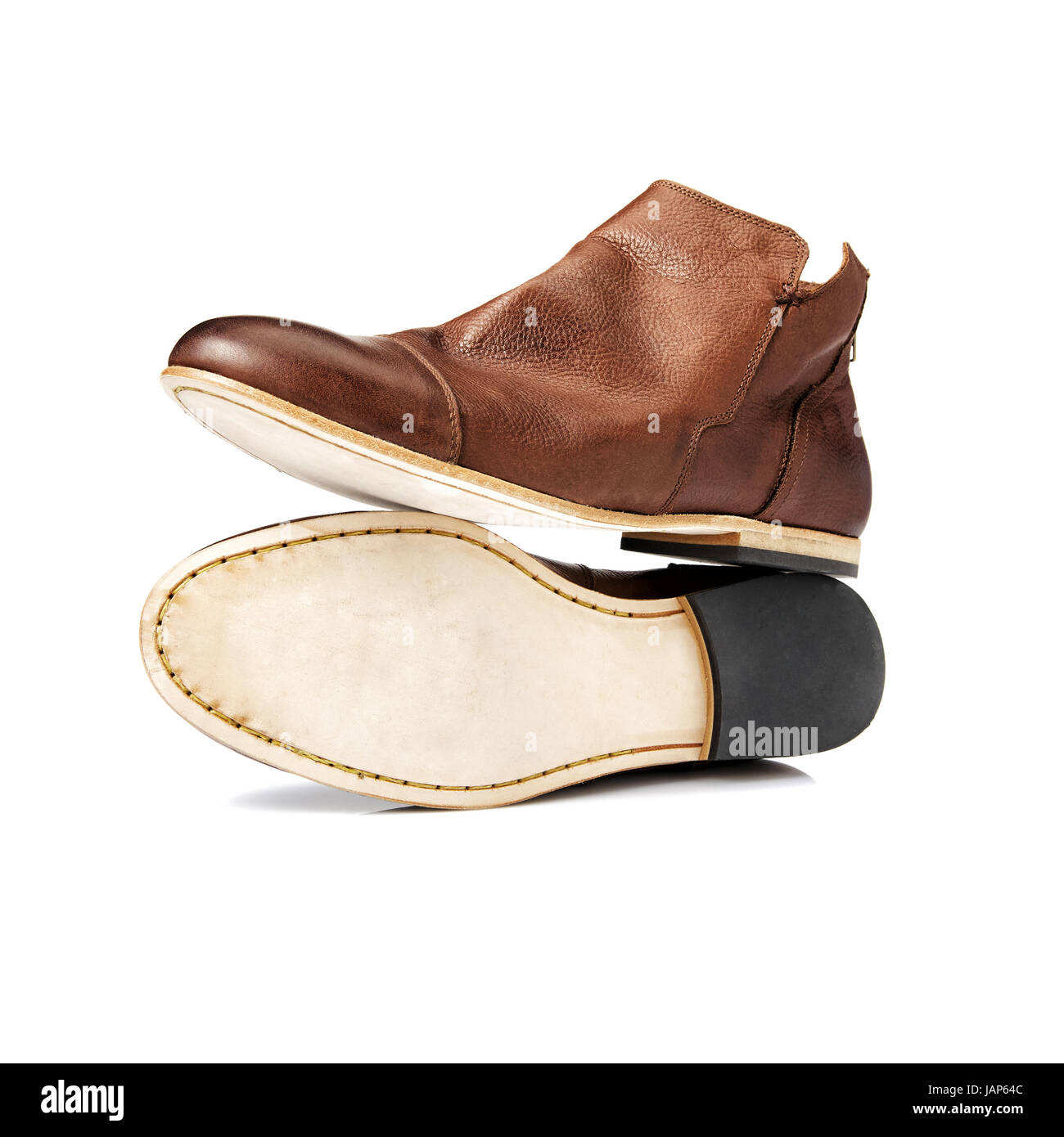 Un paio di stivali marrone. Studio shot di scarpe di cuoio. Foto Stock