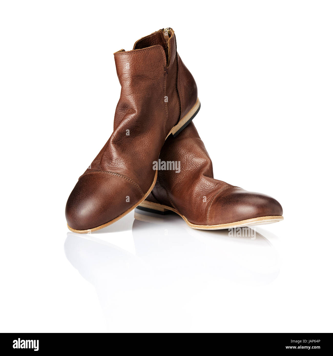 Un paio di stivali marrone. Studio shot di scarpe di cuoio. Foto Stock