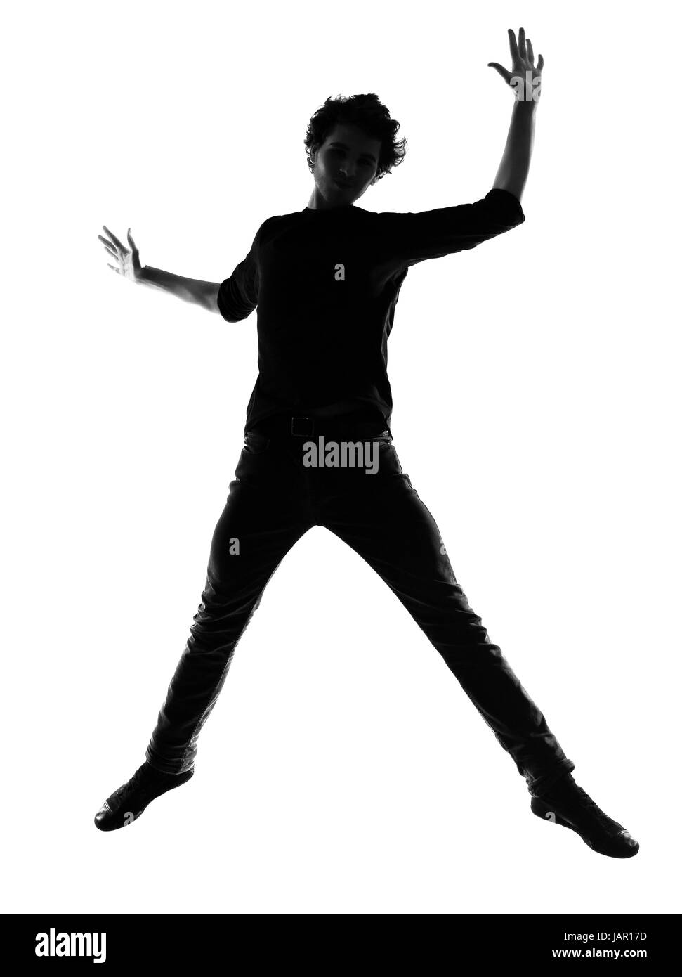 Giovane uomo silhouette in studio isolato su sfondo bianco Foto Stock