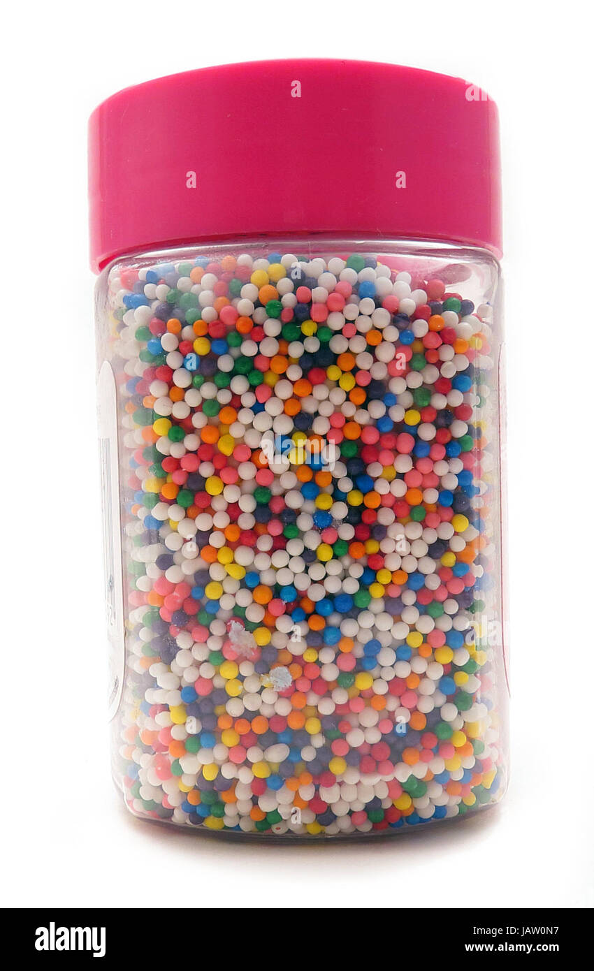 Negli zuccherini colorati per la decorazione di torta in un vaso con  coperchio rosa Foto stock - Alamy