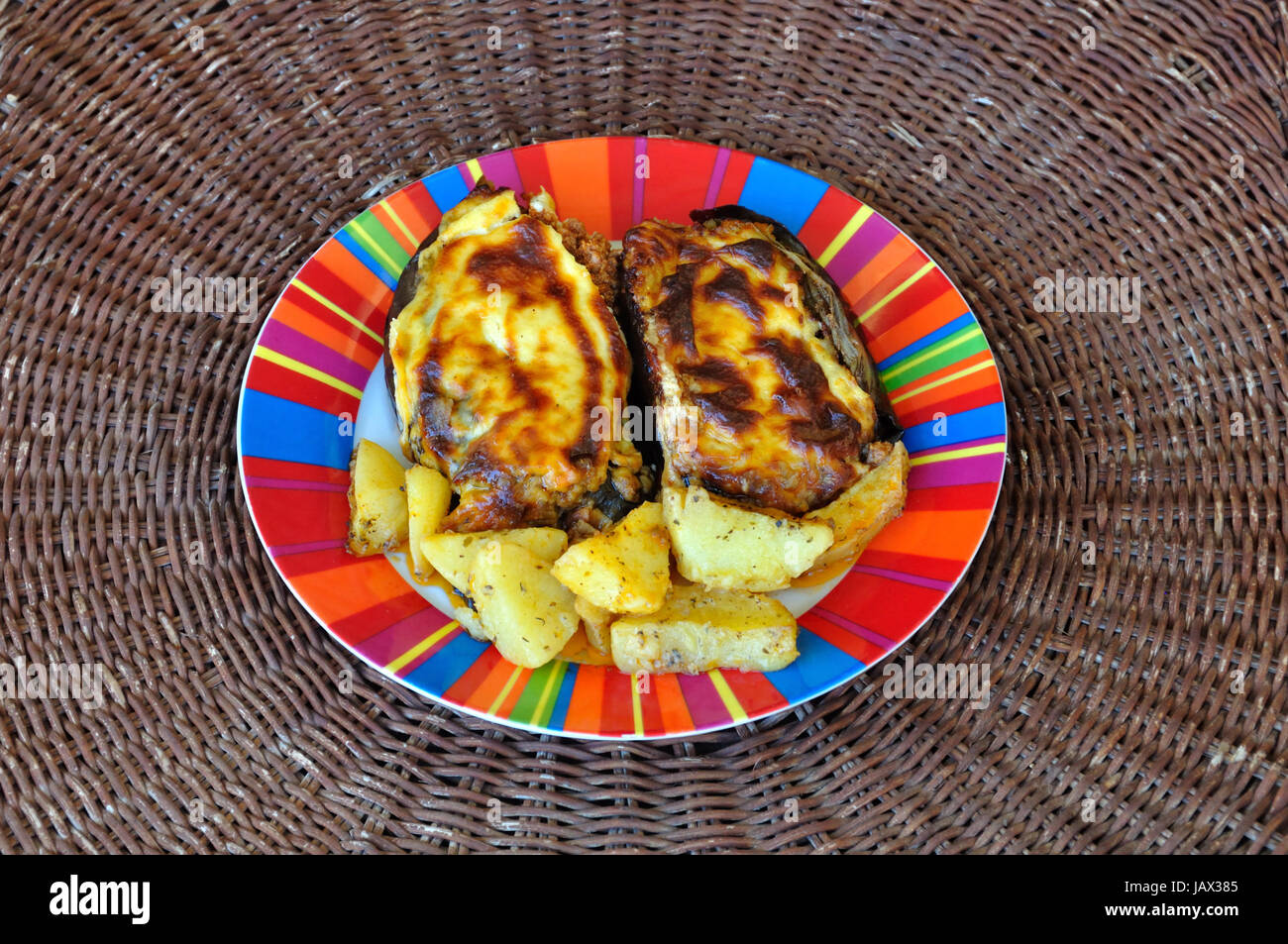 Le melanzane farcite con carne di manzo macinata e besciamella salsa ... Le melanzane farcite con carne di manzo macinata e besciamella salsa ...