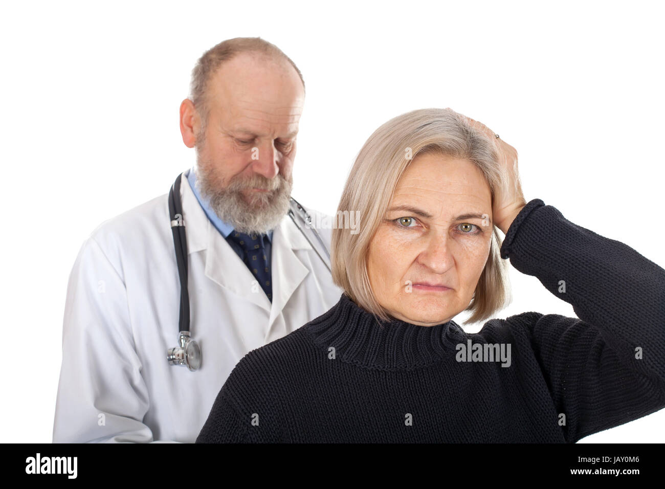 Immagine di un sconvolto pacient con gravi mal di testa e il suo medico Foto Stock