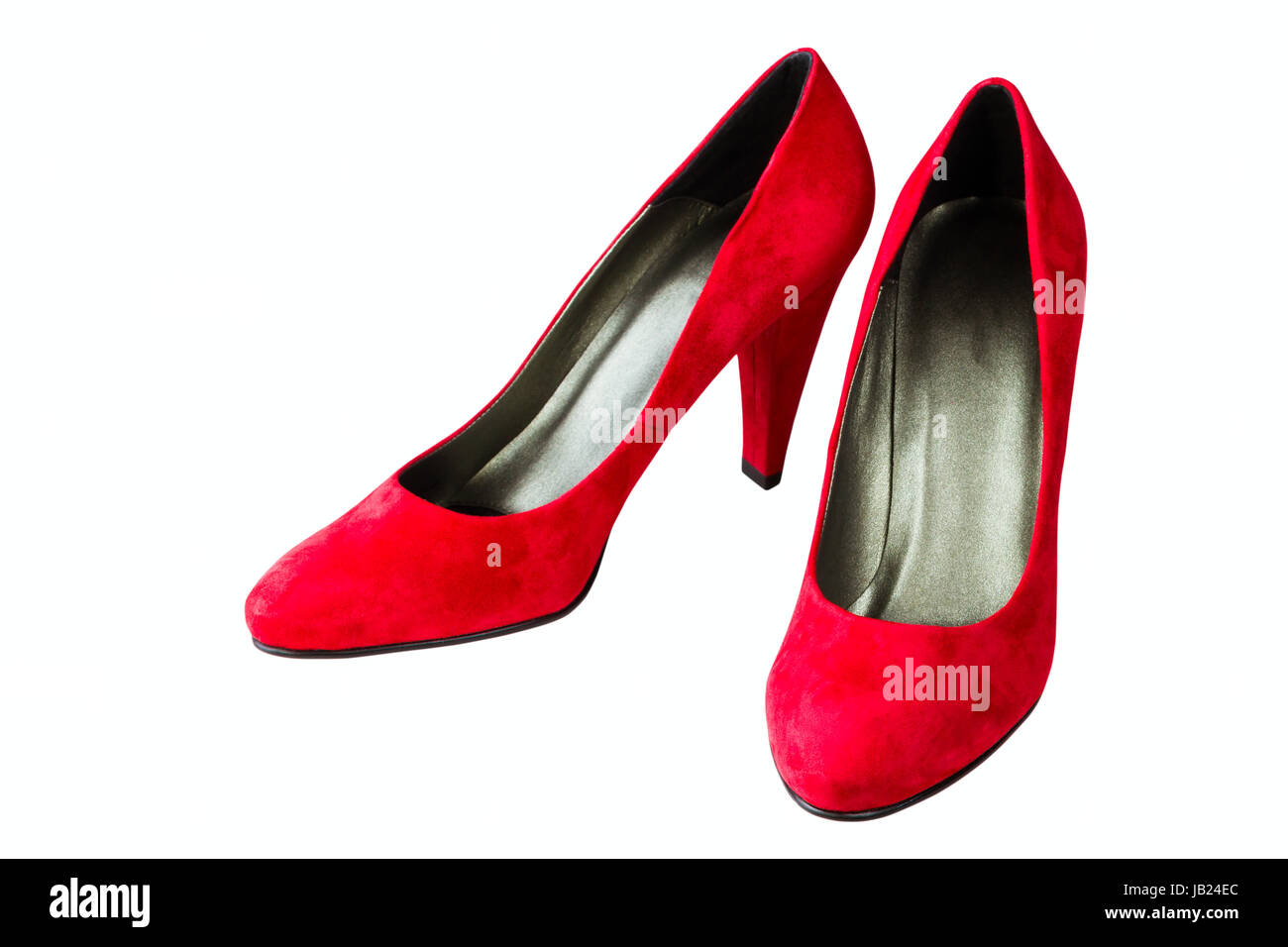 Donna di velluto rosso scarpe isolati su sfondo bianco Foto Stock