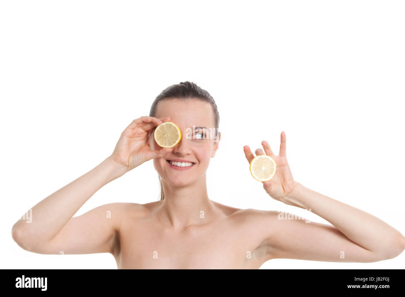 Junge Frau mit einer limone Foto Stock