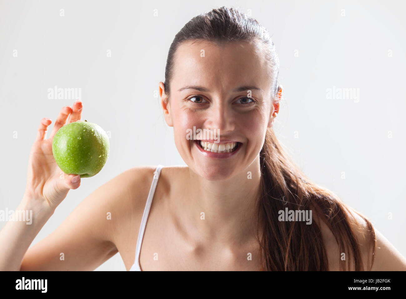 Junge Frau Mit einem Apfel Foto Stock